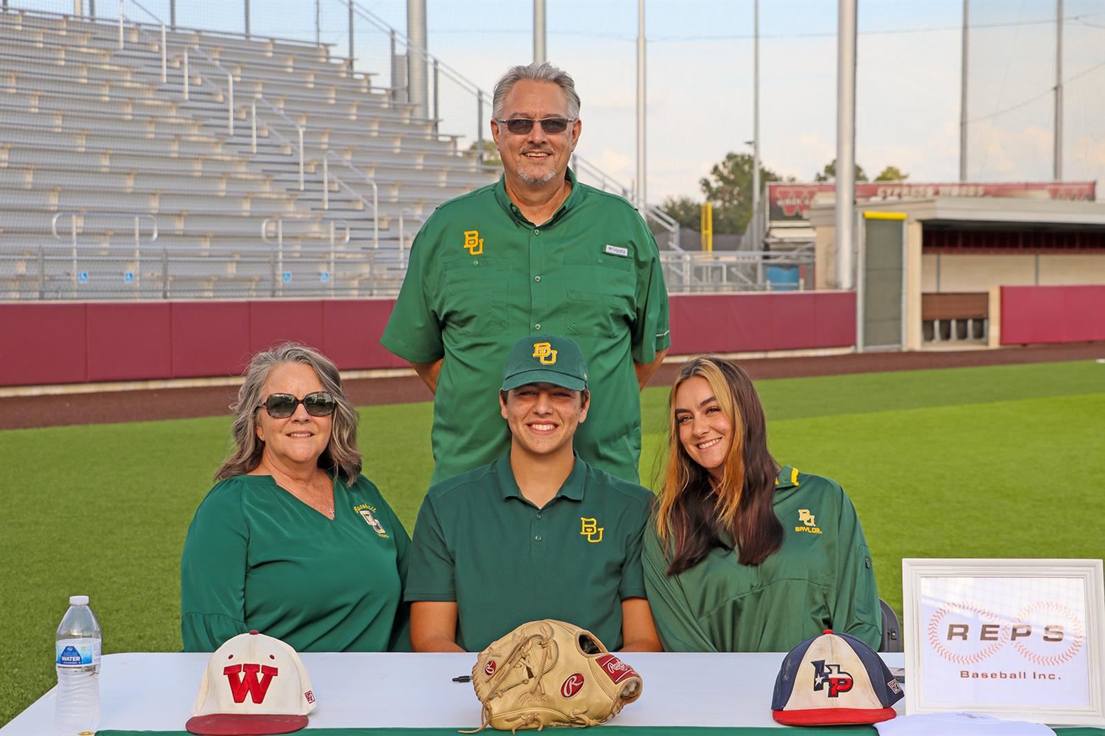 Cypress Woods High School senior Mason Green, seated center, signed a letter of intent to play baseball at Baylor University.